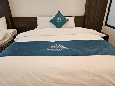 Chambre lits jumeaux avec vue sur la montagne — SAPA COSY HOTEL