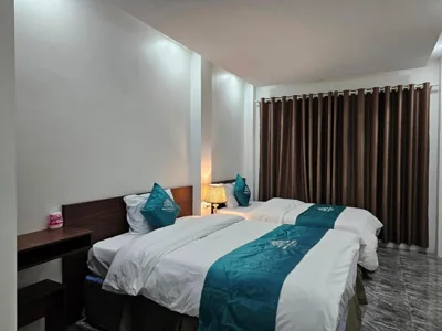 Chambre double avec deux lits doubles — SAPA COSY HOTEL